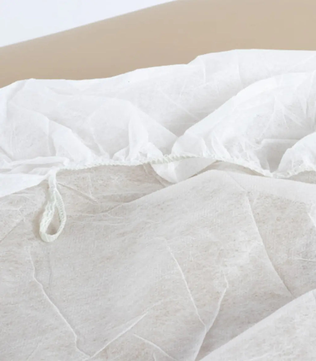 Draps housses de table jetables (lot de 100)